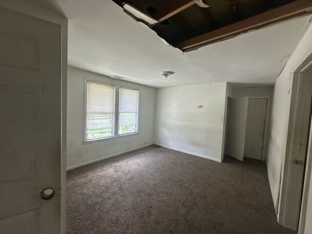 15201 Turlington Ave, Harvey, IL 60426 - carpeted empty room featuring baseboards