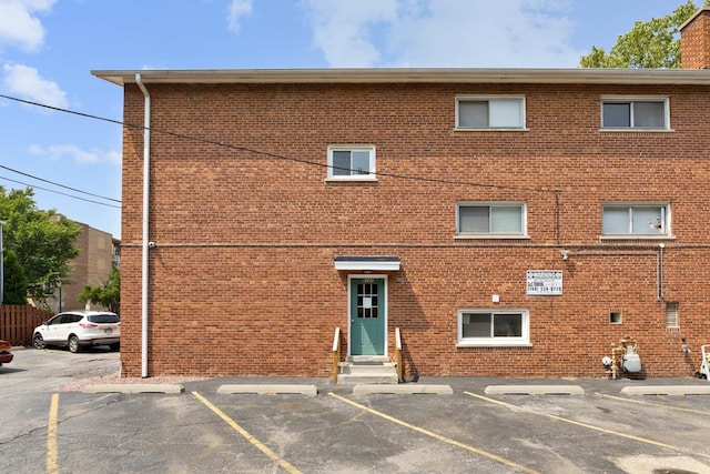 1107 Washington Blvd Unit 2E, Oak Park, IL 60302 - view of property with entry steps and uncovered parking