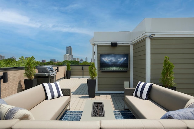 3828 N Racine Ave Unit 3, Chicago, IL 60613 - deck featuring an outdoor living space with a fire pit and a grill