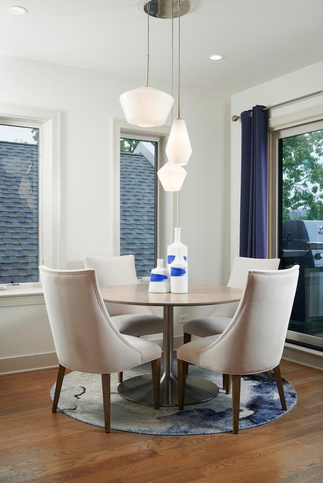 3828 N Racine Ave Unit 3, Chicago, IL 60613 - dining area featuring wood finished floors and recessed lighting