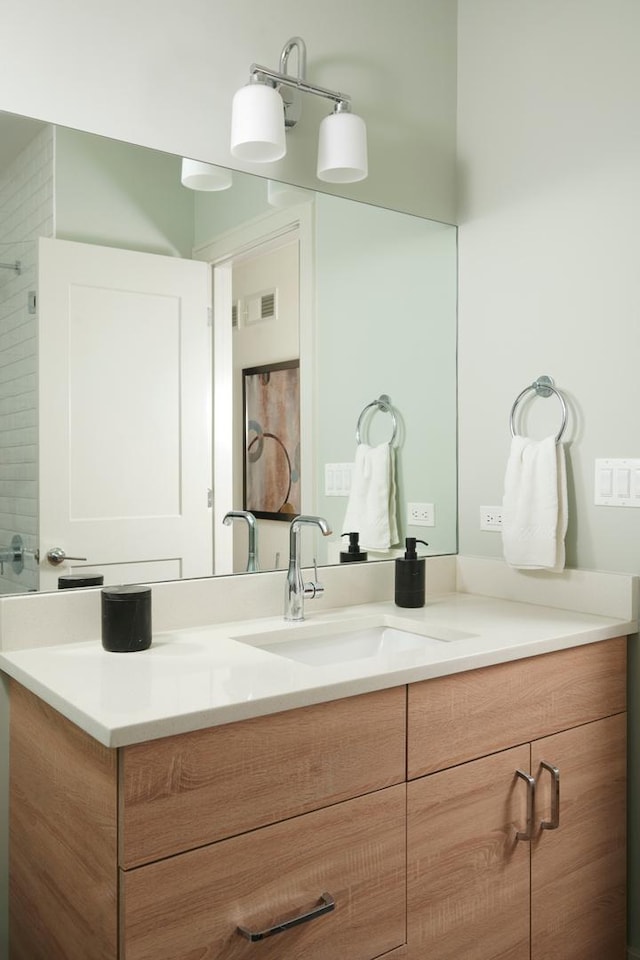 3828 N Racine Ave Unit 3, Chicago, IL 60613 - bathroom with vanity and tiled shower