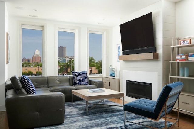 3828 N Racine Ave Unit 3, Chicago, IL 60613 - living room with a fireplace and wood finished floors