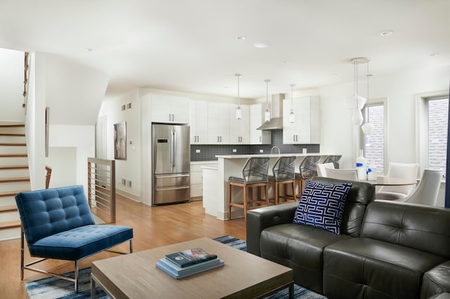 3828 N Racine Ave Unit 3, Chicago, IL 60613 - living area with light wood-type flooring, stairs, and recessed lighting