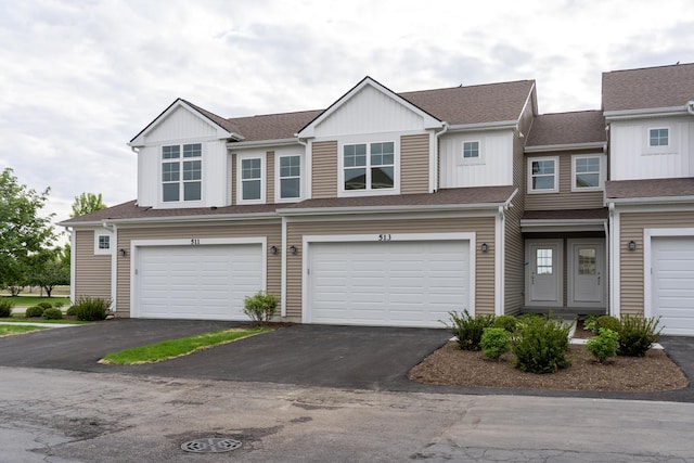 LOT15 Amherst Dr Unit B, Sycamore, IL 60178 - multi unit property with driveway, an attached garage, roof with shingles, and board and batten siding