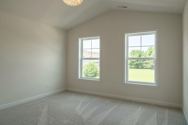 LOT15 Amherst Dr Unit B, Sycamore, IL 60178 - spare room with plenty of natural light, light colored carpet, baseboards, and lofted ceiling