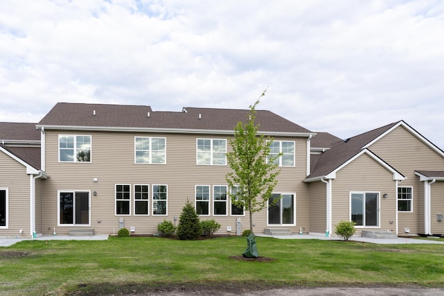 LOT15 Amherst Dr Unit B, Sycamore, IL 60178 - back of house with entry steps, a yard, and a patio area