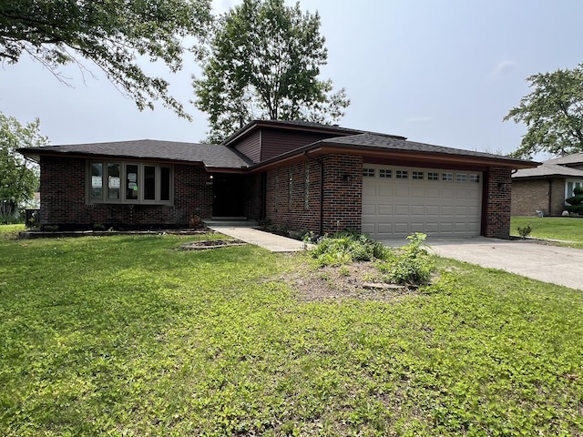6047 Elm Ln, Matteson, IL 60443 - view of front facade with an attached garage, brick siding, a front lawn, and concrete driveway