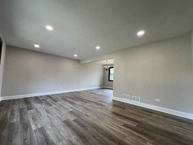 6047 Elm Ln, Matteson, IL 60443 - unfurnished room featuring a chandelier, dark wood-style flooring, baseboards, and recessed lighting