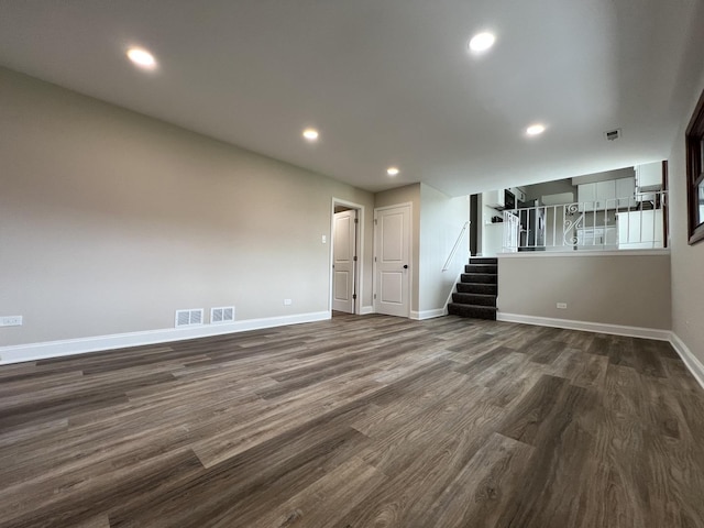 6047 Elm Ln, Matteson, IL 60443 - unfurnished living room featuring dark wood finished floors, baseboards, stairs, and recessed lighting