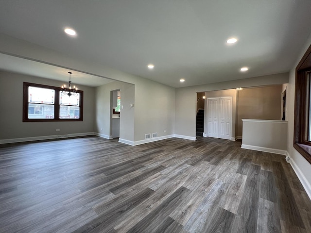 6047 Elm Ln, Matteson, IL 60443 - spare room featuring a chandelier, dark wood-style floors, baseboards, and recessed lighting