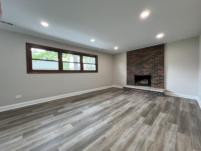 6047 Elm Ln, Matteson, IL 60443 - unfurnished living room featuring wood finished floors, a fireplace, baseboards, and recessed lighting