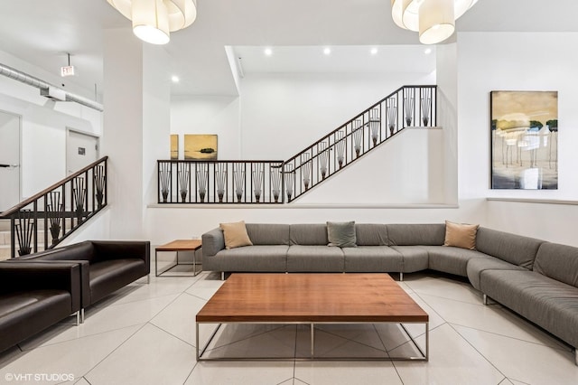 758 N Larrabee St Unit 427, Chicago, IL 60654 - tiled living area with stairs and recessed lighting