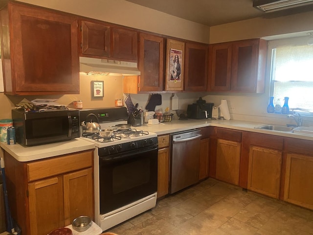 7545 Beloit Ave, Bridgeview, IL 60455 - kitchen featuring gas range oven, under cabinet range hood, stainless steel dishwasher, black microwave, and a sink