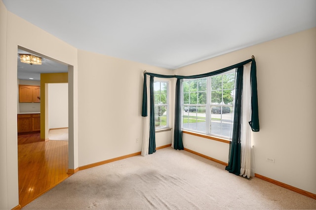 213 Stillwater Ct, Oswego, IL 60543 - empty room with baseboards and light colored carpet