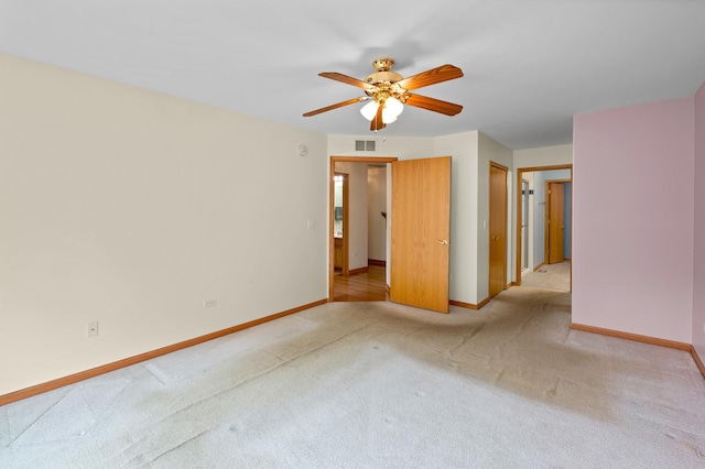213 Stillwater Ct, Oswego, IL 60543 - unfurnished room featuring light colored carpet and ceiling fan