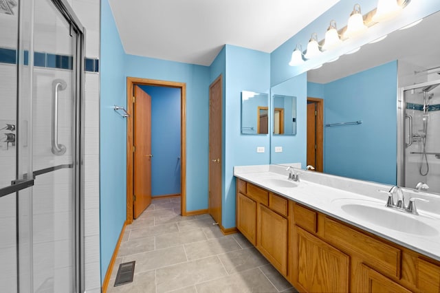 213 Stillwater Ct, Oswego, IL 60543 - full bathroom featuring a stall shower, double vanity, and tile patterned flooring