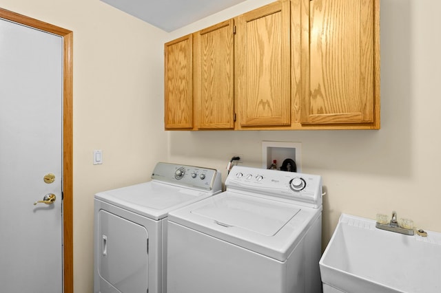213 Stillwater Ct, Oswego, IL 60543 - laundry area featuring washing machine and dryer and cabinet space