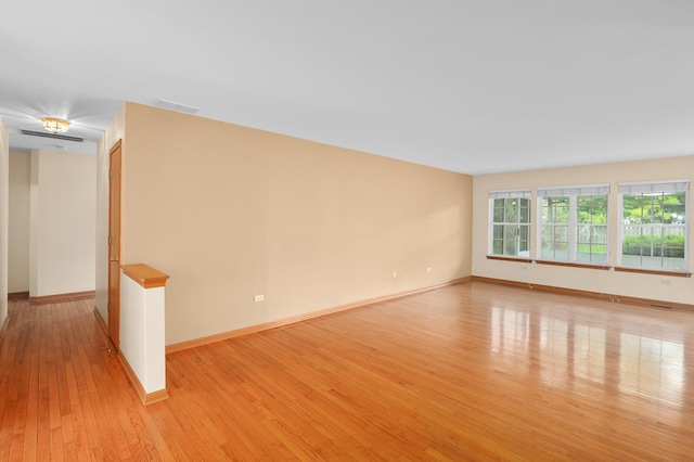 213 Stillwater Ct, Oswego, IL 60543 - empty room with light wood finished floors and baseboards