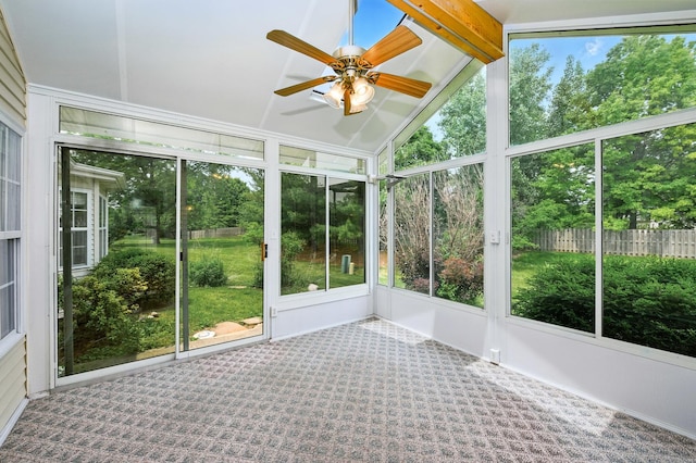 213 Stillwater Ct, Oswego, IL 60543 - unfurnished sunroom featuring a ceiling fan and view of scattered trees