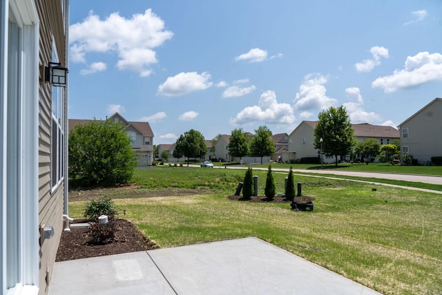 LOT15 Buckboard Ln Unit C, Sycamore, IL 60178 - view of green lawn with a residential view and a patio