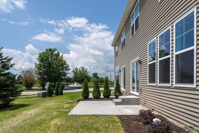 LOT15 Buckboard Ln Unit C, Sycamore, IL 60178 - view of grassy yard with a patio