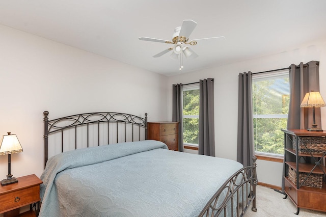 407 Anthony Ct, Oswego, IL 60543 - bedroom featuring light carpet and a ceiling fan