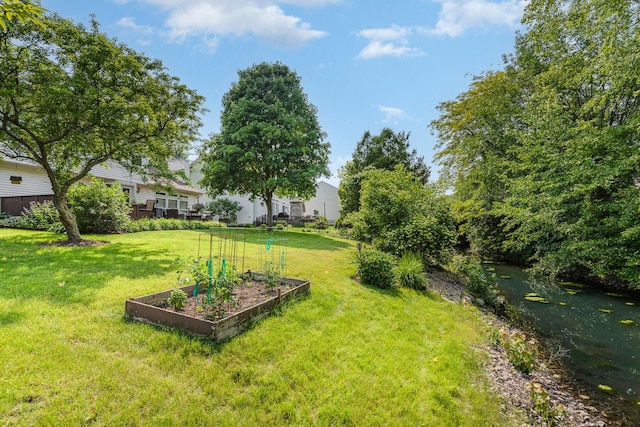 407 Anthony Ct, Oswego, IL 60543 - view of grassy yard with a vegetable garden