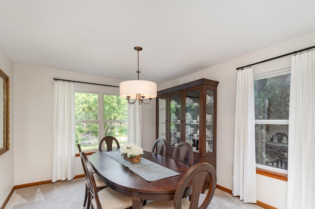 407 Anthony Ct, Oswego, IL 60543 - dining area with a chandelier and light colored carpet