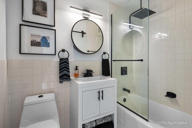 1150 N Lake Shore Dr Unit 19A, Chicago, IL 60611 - full bath with tile walls, vanity, a combined bath / shower with rainfall shower, and wainscoting