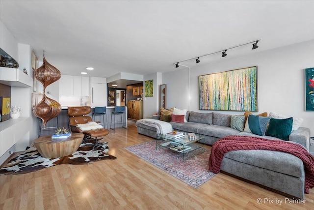 1150 N Lake Shore Dr Unit 19A, Chicago, IL 60611 - living room with wood finished floors, rail lighting, and recessed lighting