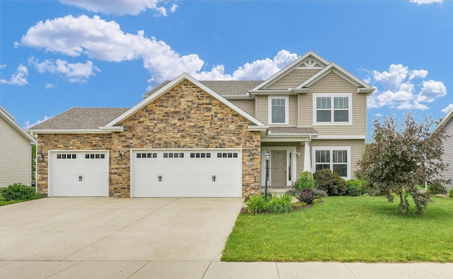 2107 Max Run Dr E, Champaign, IL 61822 - craftsman house with a front yard, driveway, stone siding, a garage, and roof with shingles