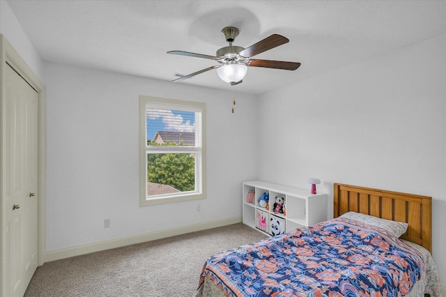 2107 Max Run Dr E, Champaign, IL 61822 - carpeted bedroom featuring ceiling fan and a closet