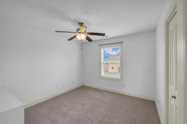 2107 Max Run Dr E, Champaign, IL 61822 - carpeted spare room featuring ceiling fan and baseboards
