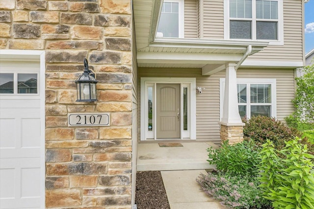 2107 Max Run Dr E, Champaign, IL 61822 - property entrance featuring stone siding