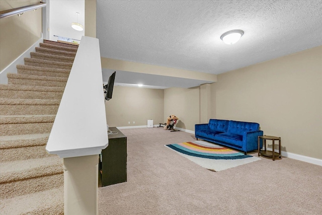 2107 Max Run Dr E, Champaign, IL 61822 - rec room with carpet flooring and a textured ceiling