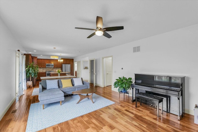 2107 Max Run Dr E, Champaign, IL 61822 - living room featuring light wood-type flooring, ceiling fan, and recessed lighting