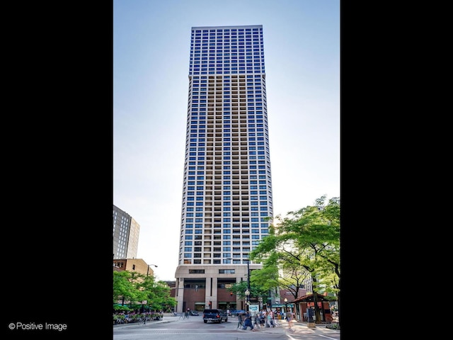 1030 N State St Unit 44L, Chicago, IL 60610 - view of building exterior with uncovered parking