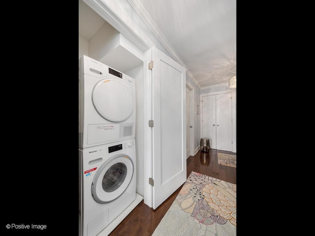 1030 N State St Unit 44L, Chicago, IL 60610 - laundry area featuring stacked washer / drying machine and dark wood-style floors