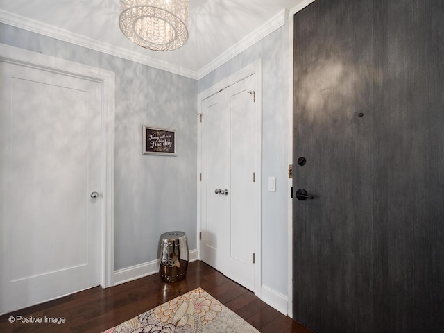 1030 N State St Unit 44L, Chicago, IL 60610 - foyer entrance with wood finished floors, a chandelier, baseboards, and ornamental molding