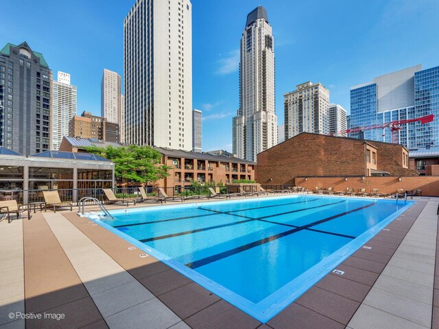 1030 N State St Unit 44L, Chicago, IL 60610 - community pool with a skyline view