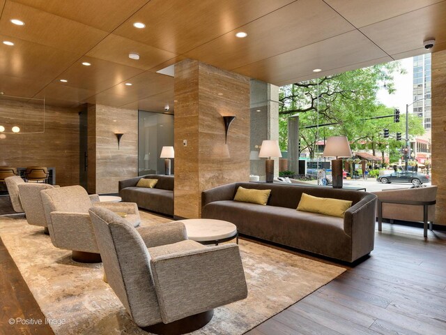 1030 N State St Unit 44L, Chicago, IL 60610 - common area with a security system, recessed lighting, and a wall of windows