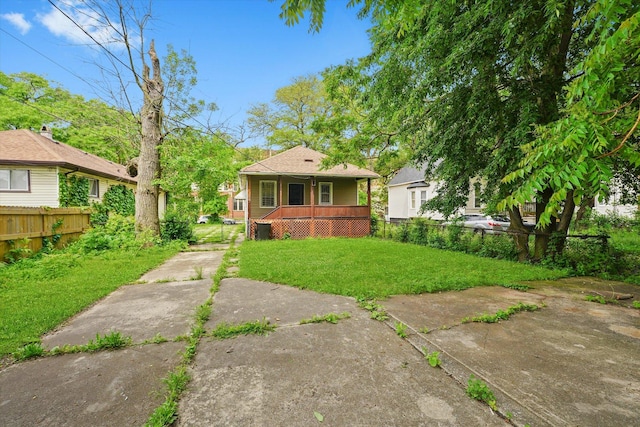 11219 S Wallace St, Chicago, IL 60628 - rear view of house featuring covered porch