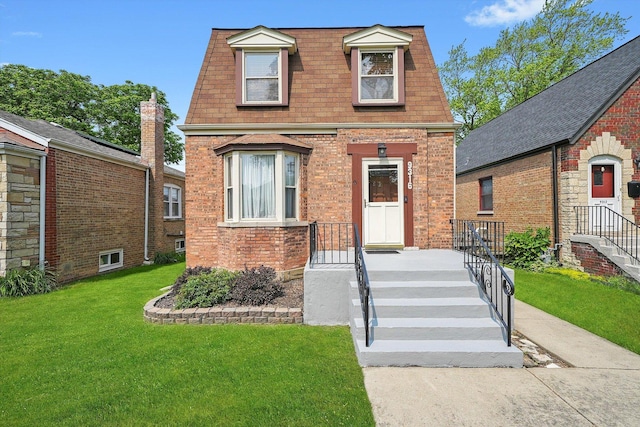 9316 S Utica Ave, Evergreen Park, IL 60805 - view of front of house featuring a front yard, brick siding, roof with shingles, and mansard roof