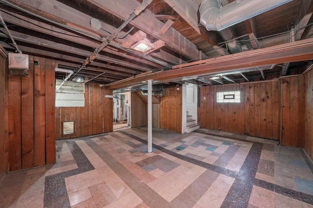 9316 S Utica Ave, Evergreen Park, IL 60805 - below grade area featuring stairway, wooden walls, and tile patterned floors