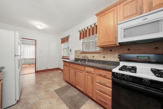 9316 S Utica Ave, Evergreen Park, IL 60805 - kitchen featuring white appliances, decorative backsplash, and dark stone countertops
