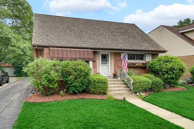 18625 Lexington Ave, Homewood, IL 60430 - view of front of property featuring brick siding and roof with shingles