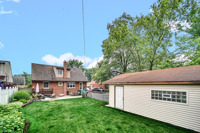 18625 Lexington Ave, Homewood, IL 60430 - rear view of property featuring a patio, a chimney, roof with shingles, and brick siding