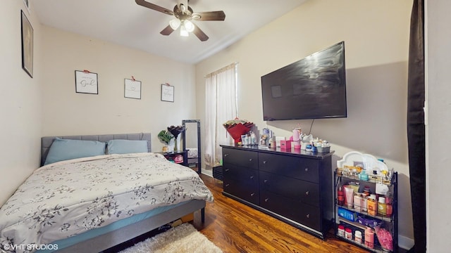 4338 W Adams St, Chicago, IL 60624 - bedroom with dark wood-style flooring and ceiling fan