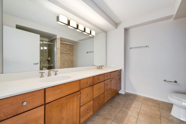 9715 Woods Dr Unit 700, Skokie, IL 60077 - bathroom featuring double vanity, a stall shower, toilet, baseboards, and tile patterned flooring