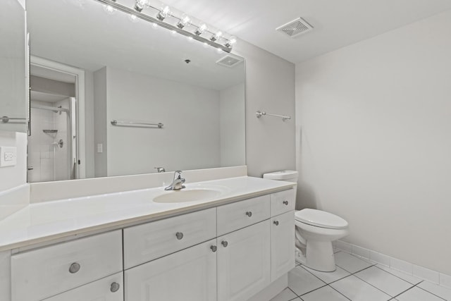 730 Creekside Dr Unit 104, Mount Prospect, IL 60056 - bathroom with vanity, tile patterned floors, and a shower